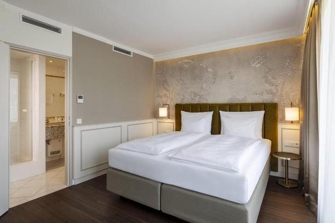 Imagen de la habitación del Hotel Arcotel Castellani Salzburg. Foto 13