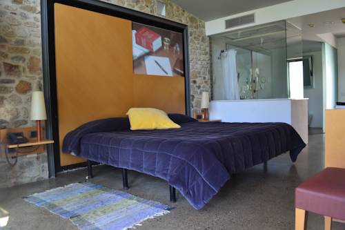 Imagen de la habitación del Hotel Arcs De Monells. Foto 4