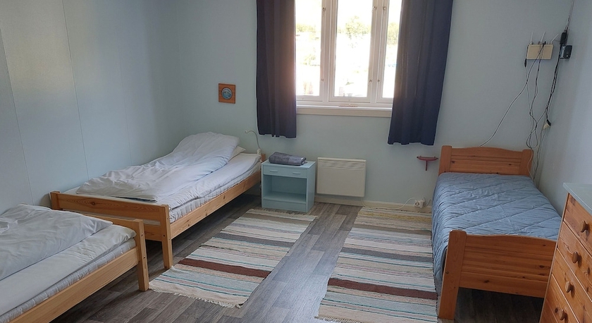 Imagen de la habitación del Hotel Arctic Ocean Lodge. Foto 15