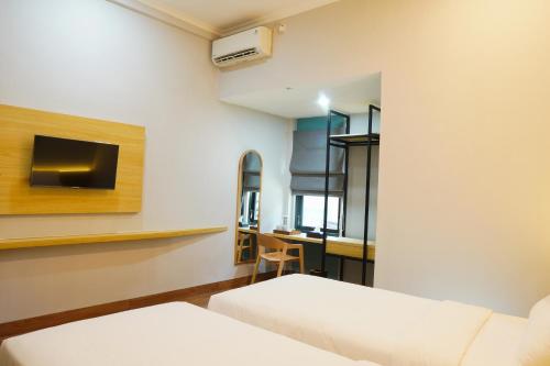 Imagen de la habitación del Hotel Ardiana Suite By Sajiwa. Foto 13