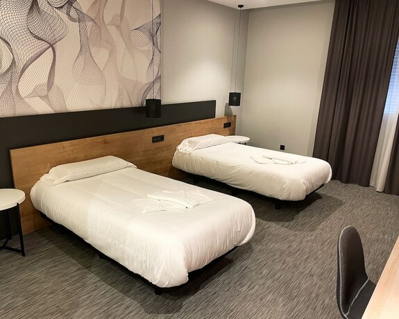 Imagen de la habitación del Hotel Area 507. Foto 17