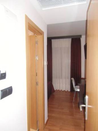 Imagen de la habitación del Hotel Area De Servicio Villamartín. Foto 8