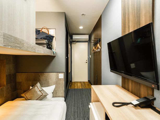 Imagen de la habitación del Hotel Areaone Kitaibaraki. Foto 3