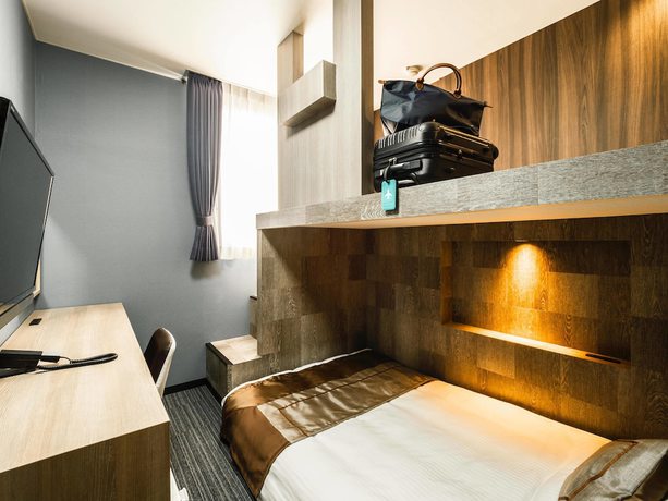 Imagen de la habitación del Hotel Areaone Kitaibaraki. Foto 5
