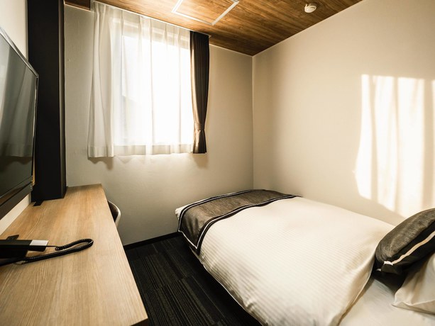Imagen de la habitación del Hotel Areaone Kitaibaraki. Foto 10