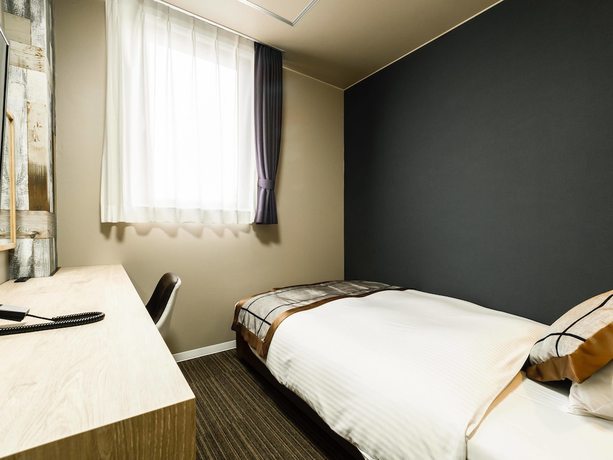 Imagen de la habitación del Hotel Areaone Kitaibaraki. Foto 11
