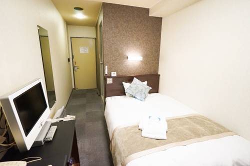 Imagen de la habitación del Hotel Areaone Miyazaki City. Foto 1