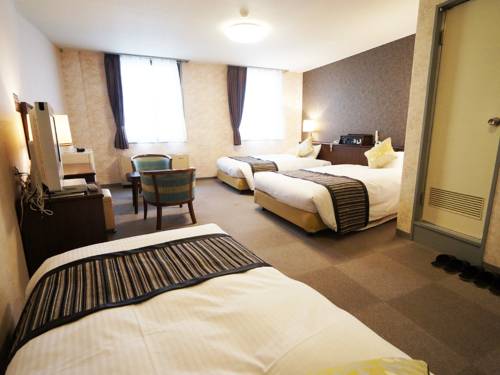 Imagen de la habitación del Hotel Areaone Miyazaki City. Foto 2