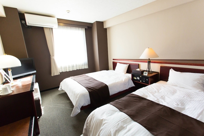 Imagen de la habitación del Hotel Areaone Miyazaki. Foto 2
