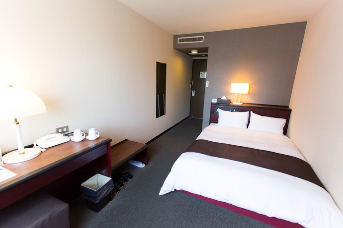 Imagen de la habitación del Hotel Areaone Miyazaki. Foto 11