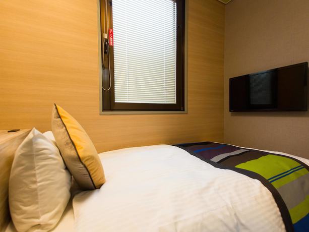Imagen de la habitación del Hotel Areaone Nobeoka. Foto 4