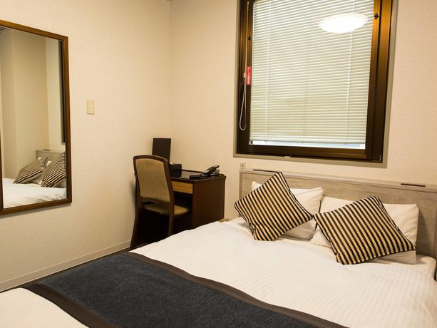 Imagen de la habitación del Hotel Areaone Nobeoka. Foto 7