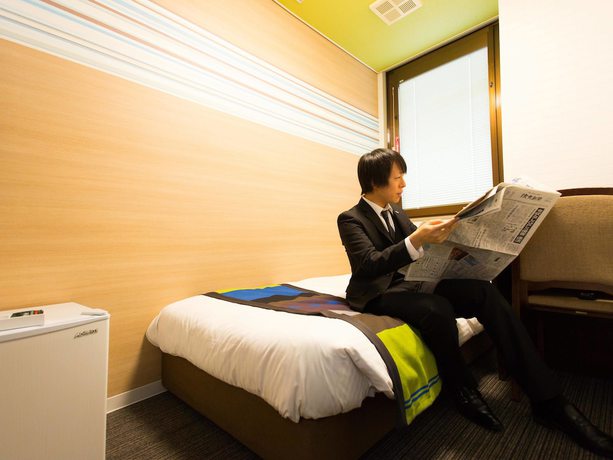 Imagen de la habitación del Hotel Areaone Nobeoka. Foto 10