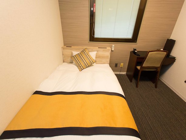 Imagen de la habitación del Hotel Areaone Nobeoka. Foto 13