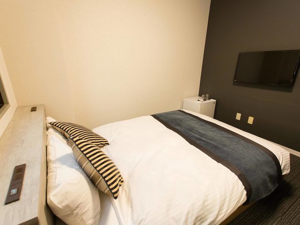 Imagen de la habitación del Hotel Areaone Nobeoka. Foto 14