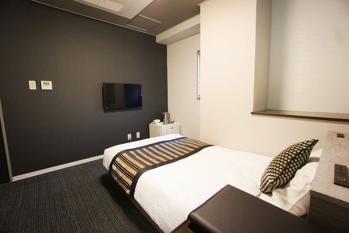 Imagen de la habitación del Hotel Areaone Nobeoka. Foto 17