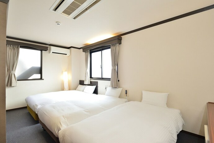 Imagen de la habitación del Hotel Areaone Takamatsu. Foto 34