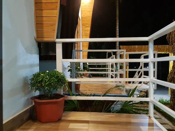 Imagen de la habitación del Hotel Areca Bungalow. Foto 31