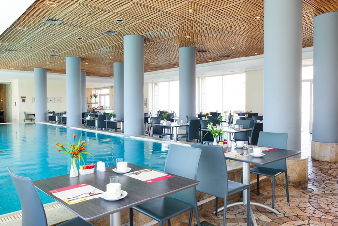 Imagen del bar/restaurante del Hotel Arena By The Beach. Foto 4