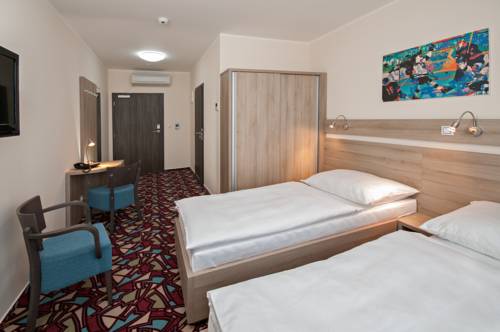 Imagen de la habitación del Hotel Arena, CHOMUTOV. Foto 12