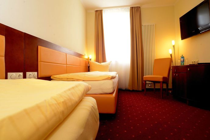 Imagen de la habitación del Hotel Arena City. Foto 7