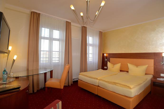 Imagen de la habitación del Hotel Arena City. Foto 16