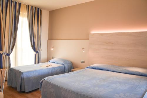 Imagen de la habitación del Hotel Arena, Colombare. Foto 8
