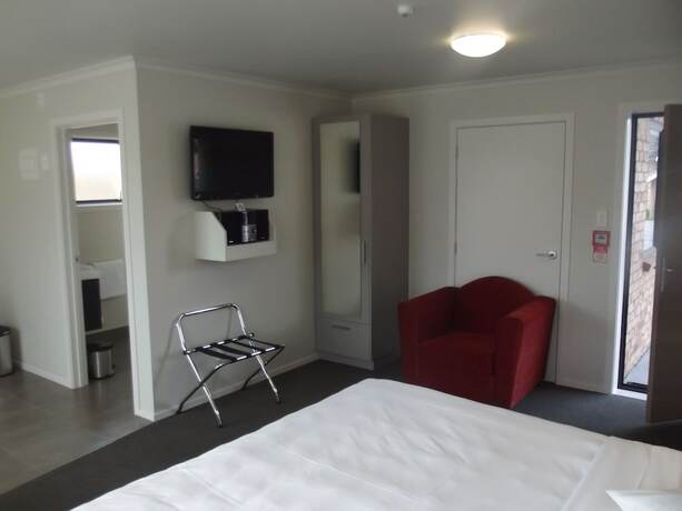 Imagen de la habitación del Hotel Arena Court Motel. Foto 19