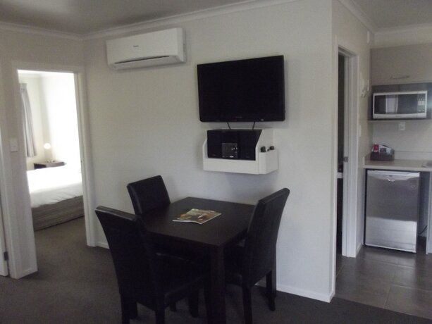 Imagen de la habitación del Hotel Arena Court Motel. Foto 20