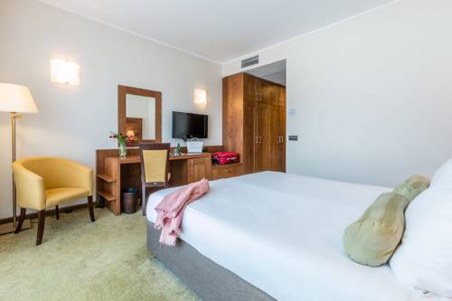 Imagen de la habitación del Hotel Arena Maribor. Foto 2