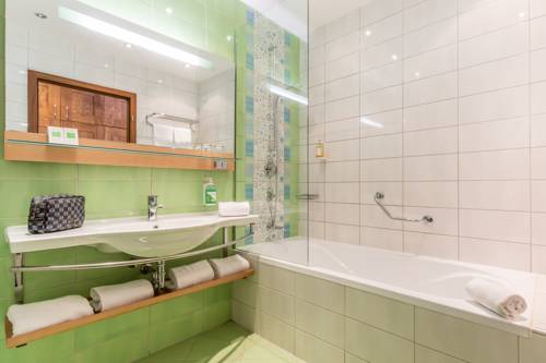 Imagen de la habitación del Hotel Arena Maribor. Foto 14