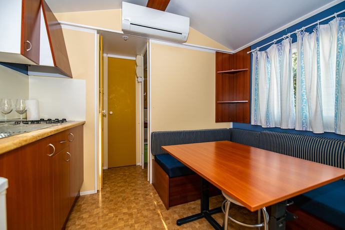 Imagen de la habitación del Hotel Arena Stoja Camping Homes. Foto 16