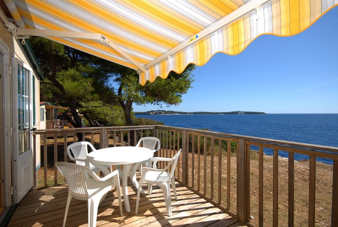 Imagen de la habitación del Hotel Arena Stoja Camping Homes. Foto 18