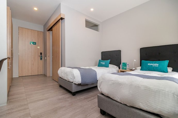 Imagen de la habitación del Hotel Arena Suites Bogota. Foto 8