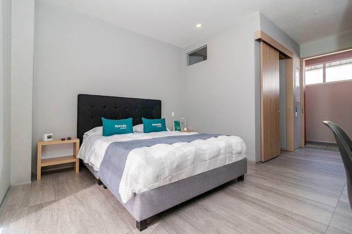 Imagen de la habitación del Hotel Arena Suites Bogota. Foto 10