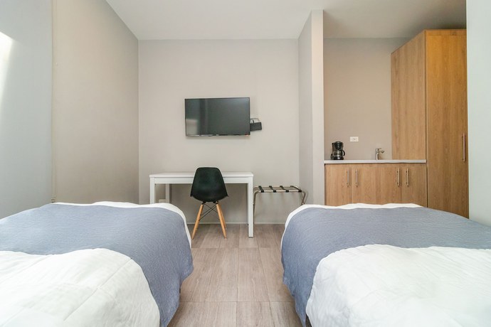 Imagen de la habitación del Hotel Arena Suites Bogota. Foto 14