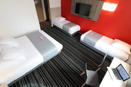 Imagen de la habitación del Hotel Arena Toulouse. Foto 11