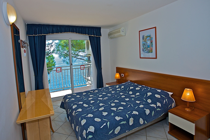 Imagen de la habitación del Hotel Arena Verudela Beach Apartments. Foto 5