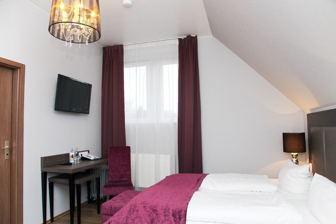 Imagen de la habitación del Hotel Arena Villa Am Wasserpark. Foto 7