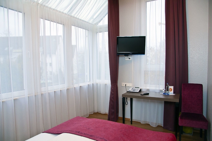 Imagen de la habitación del Hotel Arena Villa Am Wasserpark. Foto 8