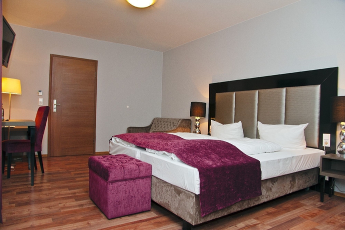 Imagen de la habitación del Hotel Arena Villa Am Wasserpark. Foto 9