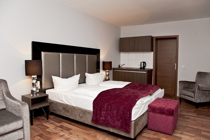 Imagen de la habitación del Hotel Arena Villa Am Wasserpark. Foto 11