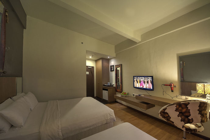 Imagen de la habitación del Hotel Arenaa Deluxe Boutique. Foto 8