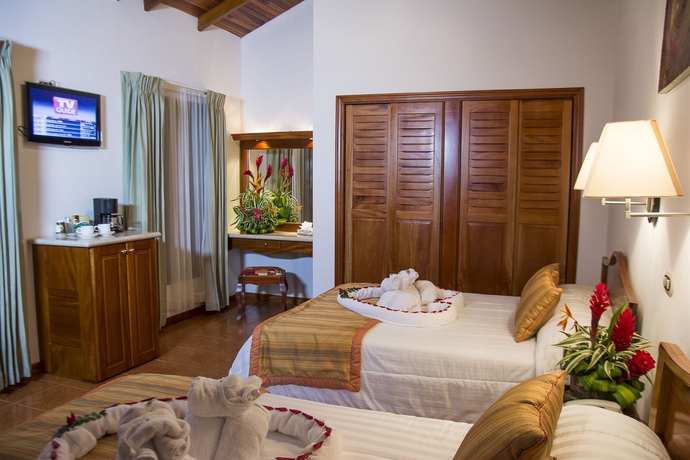 Imagen de la habitación del Hotel Arenal Paraíso Resort and Thermo Mineral Hot Springs. Foto 4