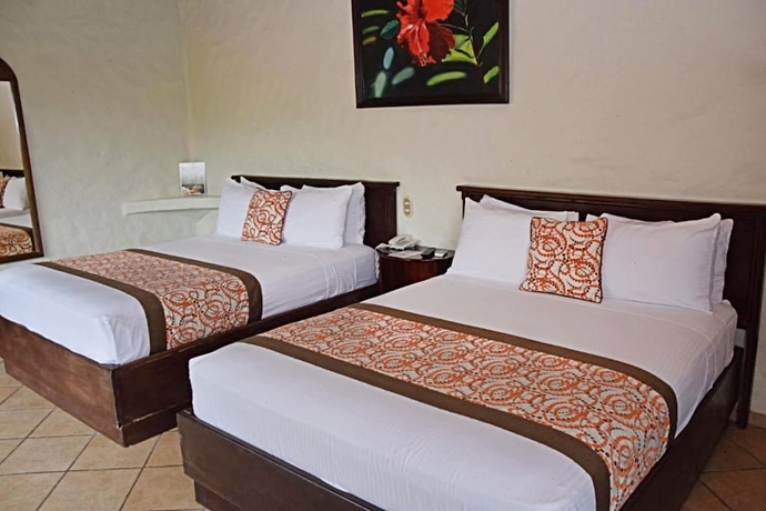 Imagen de la habitación del Hotel Arenal Volcano Inn. Foto 5