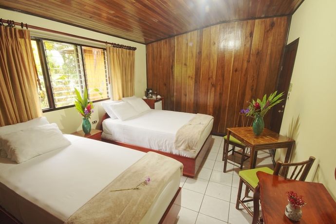 Imagen de la habitación del Hotel Arenal Waterfall Lodge. Foto 2