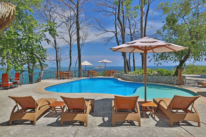 Imagen de los interiores del Hotel Arenas Del Mar Beachfront and Rainforest Member Of The Cayuga Collection. Foto 7