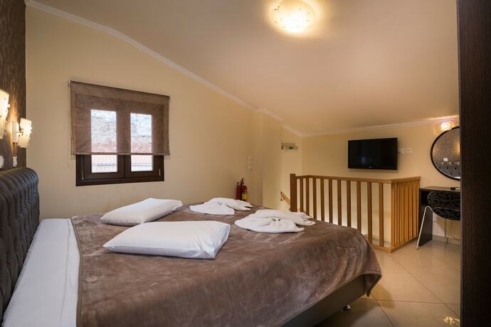 Imagen de la habitación del Hotel Areti Suites. Foto 20