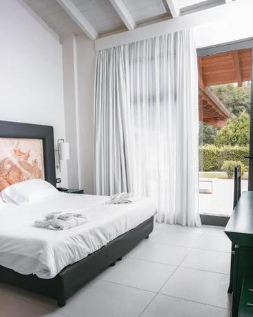 Imagen de la habitación del Hotel Argentario Lagoon Resort and Spa. Foto 7