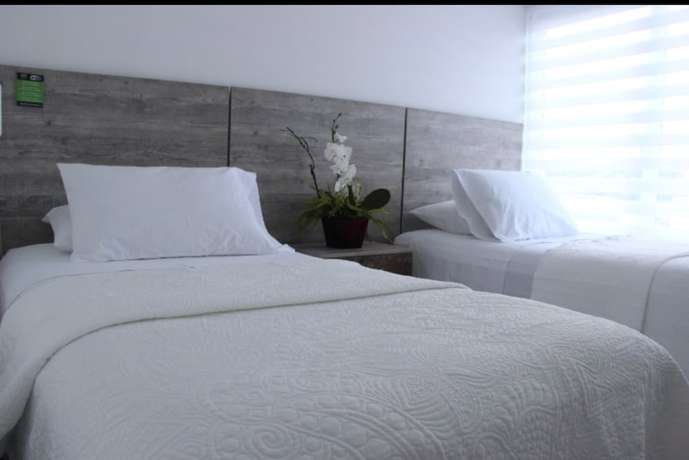 Imagen de la habitación del Hotel Ari. Foto 11